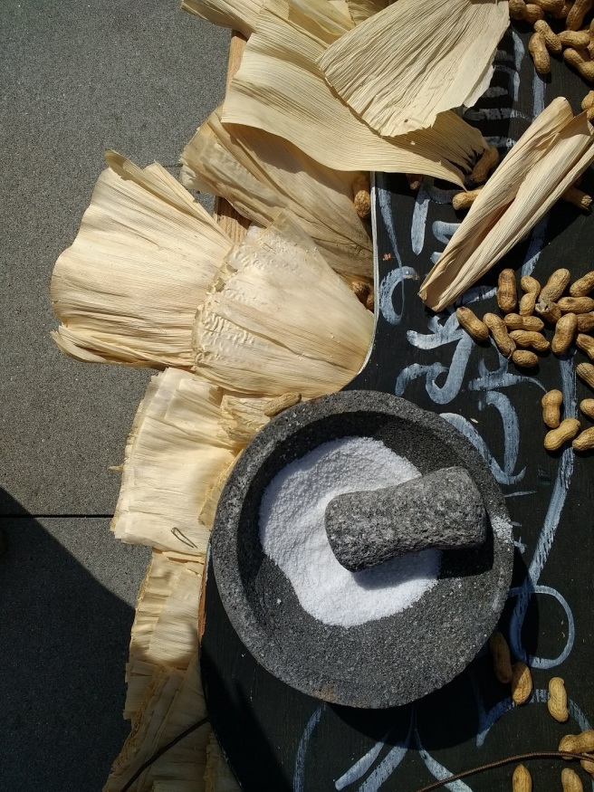 Peanuts, salt and corn husks on Dia de los Muertos altar Grand Park